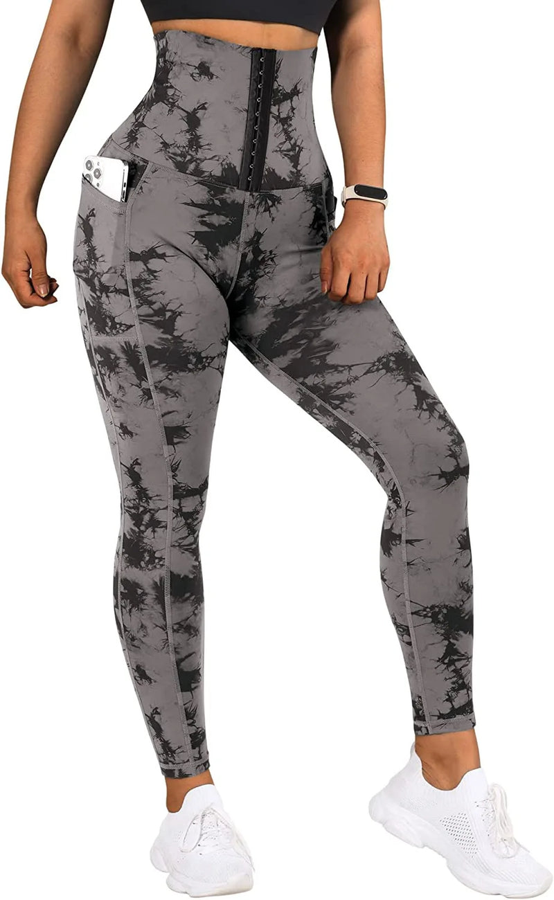 Calça Legging com Cinta de Alta Compressão e Bolsos Laterais